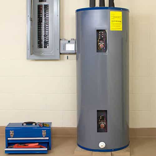 an electric water heater in a utility room