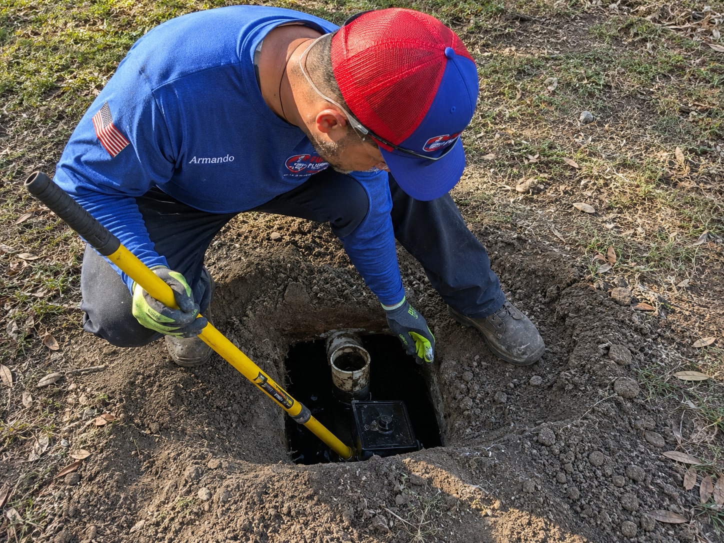 a plumber working outdoors